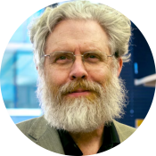 George Church, a white man with a gray beard, hair and glasses