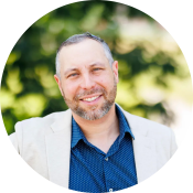 Rabbi Getzel Davis, a white man with a beard and gray hair