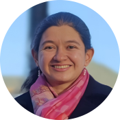 A brunette woman with a pink scarf