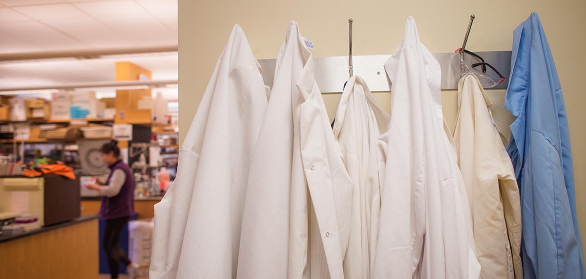 Lab Coats hanging on coat hanger